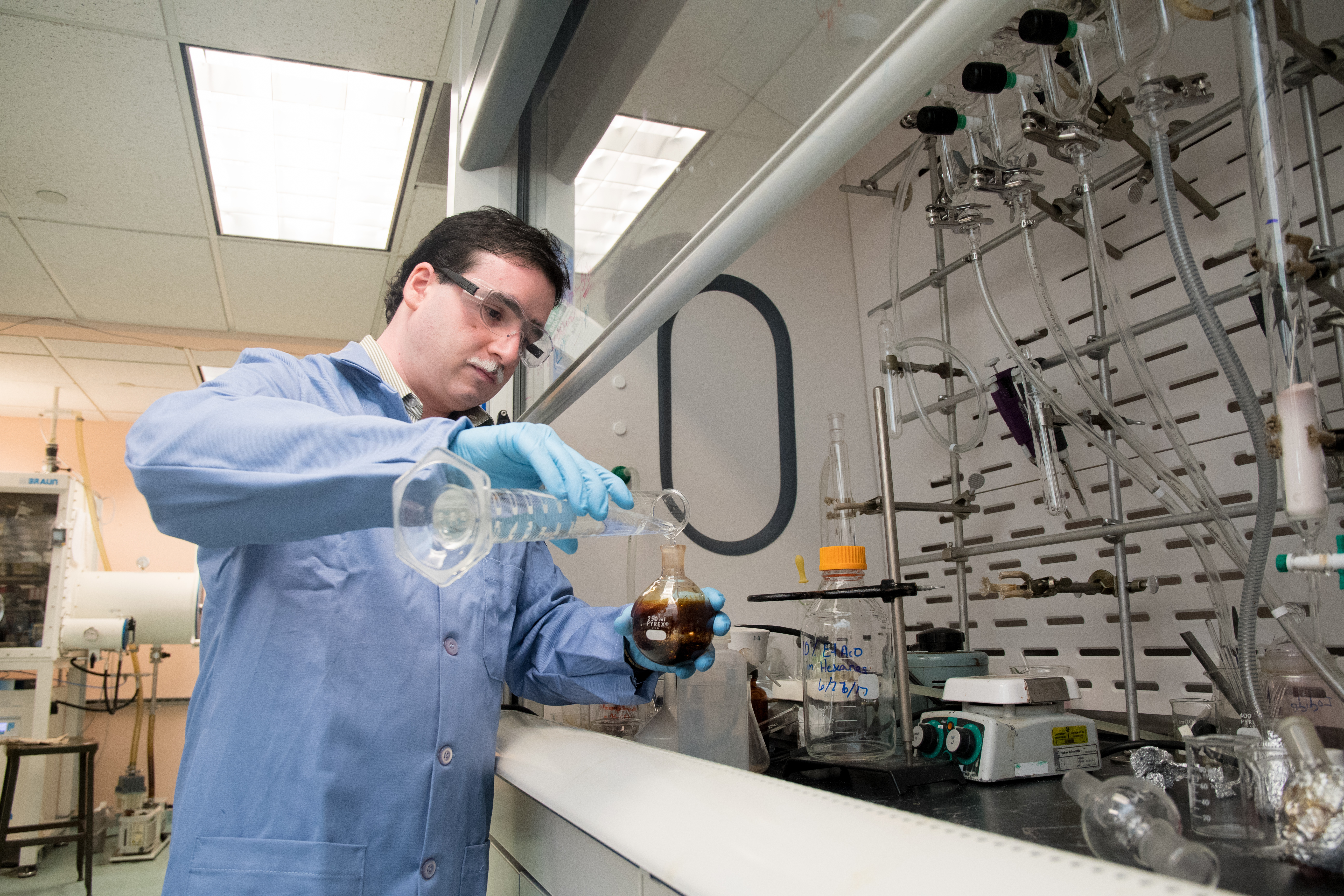 Assistant chemistry professor Shubham Vyas works in his lab at Colorado School of Mines.